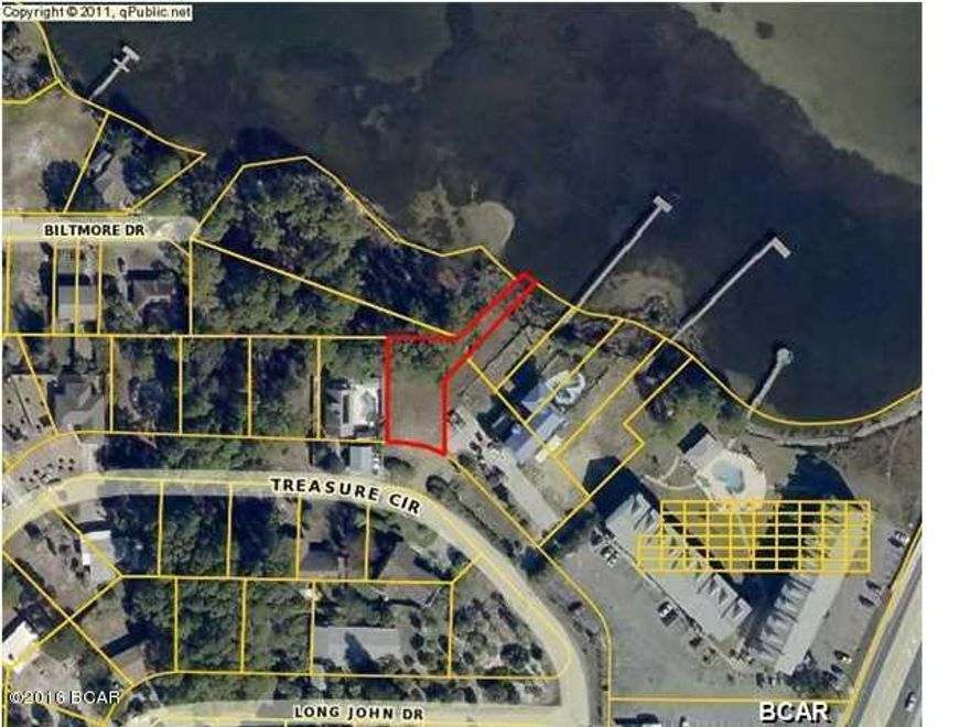 Irregular shaped Lagoon Front Lot. You could build your dream home with a Zen Garden in the back yard.. Put a dock in for Kayaking or boating on the lagoon with just a few minutes ride by boat to the pass and out into the Gulf of Mexico. Walking distance to Captain Anderson's and many other great Restaurant's. The Boat Marina;s are right here also for deep sea fishing tours or ride the Lady Anderson for a sunset cruise.. all within walking distance. Forth of July lagoon fire works from your yard.. or jump in your boat and watch the spectacular from their... MAKE YOUR DREAMS HAPPEN!! Call your Realtor now!!!