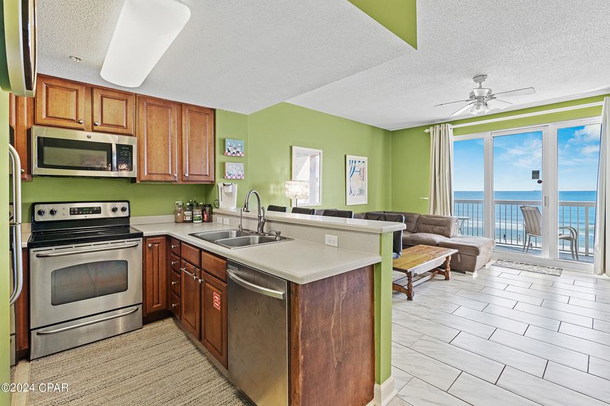 This property has sold! Discover similar listings by reaching out to us for an updated list of available properties that match your preferences.  This is coastal living at its best. Unlike most condos, this immaculate beachfront unit in popular Seychelles has never been rented and is meticulously maintained by the owners. New flooring was just added a couple of years ago. Its high 9-ft ceilings, open floor plan, and sliding doors/windows that offer breathtaking Gulf views, add a sense of spaciousness when you enter. A large private balcony, accessible from the living area and Master suite, provides an elevated vantage point for admiring the beauty of the  Emerald Coast. This condo is conveniently located on the same level as the parking deck, eliminating elevator waits and simplifying access. Seychelles is nestled in the serene East end of Panama City Beach and offers wonderful resort-style amenities - 200 feet of exclusive beach access, two Gulf-front pools with hot tubs, a fitness center, tropical landscaping and a dune walkover. Along with its amenities, the HOA fee covers utilities (water, sewer, electricity and cable) which is an exceptional benefit to Seychelles owners. Seychelles is strategically located just a minute away from St. Andrews State Park and Grand Lagoon, while the iconic Schooner's restaurant is right next door. Seize the opportunity to live the dream - this is your chance to own on the beach!