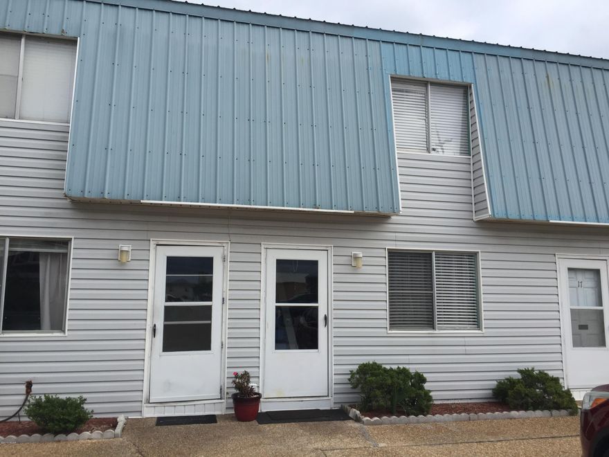 Just steps to one of the world's most beaches with deeded beach access! You must see this cute as a button Misty Harbor condo. This upgraded unit has everything including a beachy, nautical appeal. The downstairs is all tiled and includes the living room, dining area, kitchen, half bath and washer and dryer. The kitchen has all new custom cabinetry and countertops, new stove and microwave. The upstairs has all authentic bamboo hardwood floors. The  HVAC is 3 yrs old, water heater new. Misty Harbour has a community pool and dedicated grill area and is pet friendly. This unit was only enjoyed by family and not rented but vacation and long term rentals are allowed.