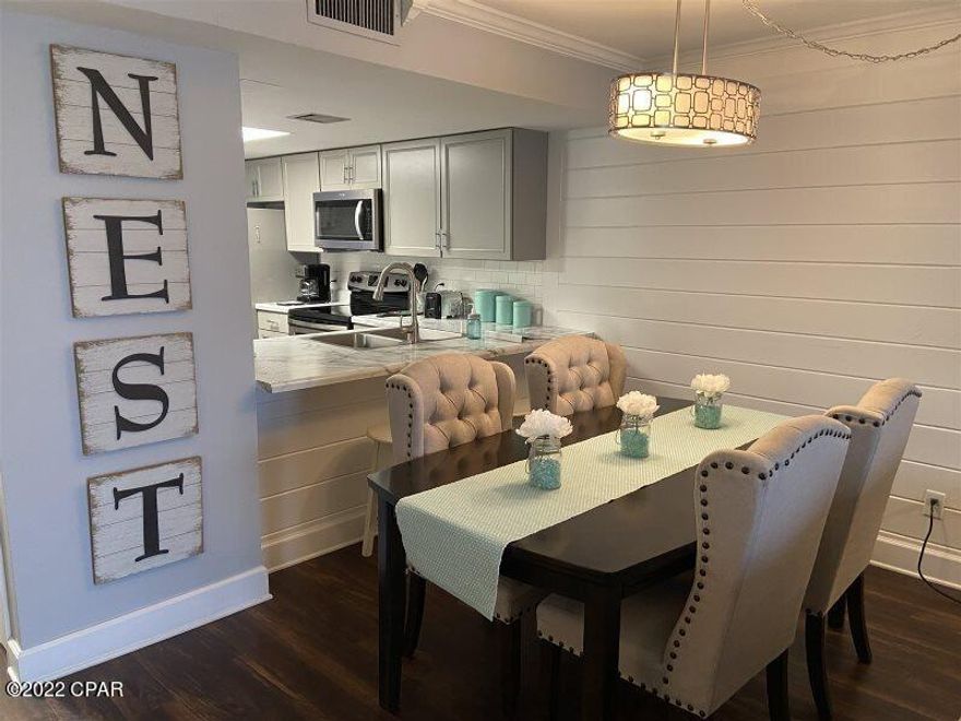 Beautifully furnished & remodeled condo, with new VP flooring throughout. New stainless appliances & a new  washer & dryer. Ship lap wall in LR & Master BR, wow...what a pop!  Crown molding thru out. Electric fireplace in LR & a new smart TV.  Master bath has walk in shower, also an owners closet installed inside of regular closet to keep your necessities. Amazing views of the beach from LR & Master BR. Sit on your balcony & take it all in... Amenities include large pool, kiddie pool,  relaxing hot tub--and beachfront pool deck for your lounging pleasure.  Tennis anyone? Our two lighted tennis courts are available day or night.  Our fitness room has just been updated with a new treadmill, recumbent bike, and elliptical machine.

***OPEN HOUSE SUN.  Jan 9th from 1-:00-4:00 pm.****