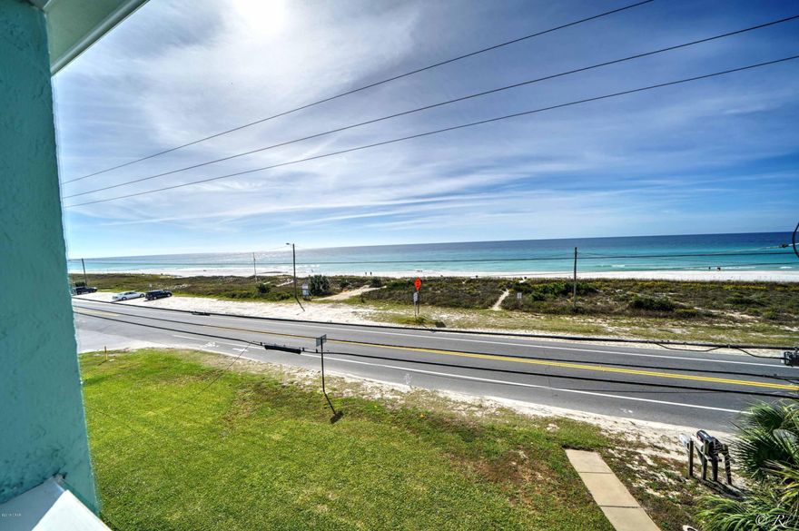 2 story condo at Emerald Shores on the West end of PCB. This complex is located outside of the hustle & bustle, offering tranquility and privacy. Direct gulf views and gulf access. Conveniently located next to the popular Carousel market. Dining/living room combo on the main floor have Gulf views, high ceilings,  and a nice large mirrored wall. The master bed is situated downstairs. Upstairs is a loft type bedroom with a full bathroom and extra storage. This fully furnished unit is decorated with contemporary furniture and lighting. Stackable washer/dryer. Updated flooring on the main floor with carpet upstairs. Dedicated beach access is about 100 feet from the door.  This unit is situated directly above the pool and bathhouse. New AC, extra flooring available.