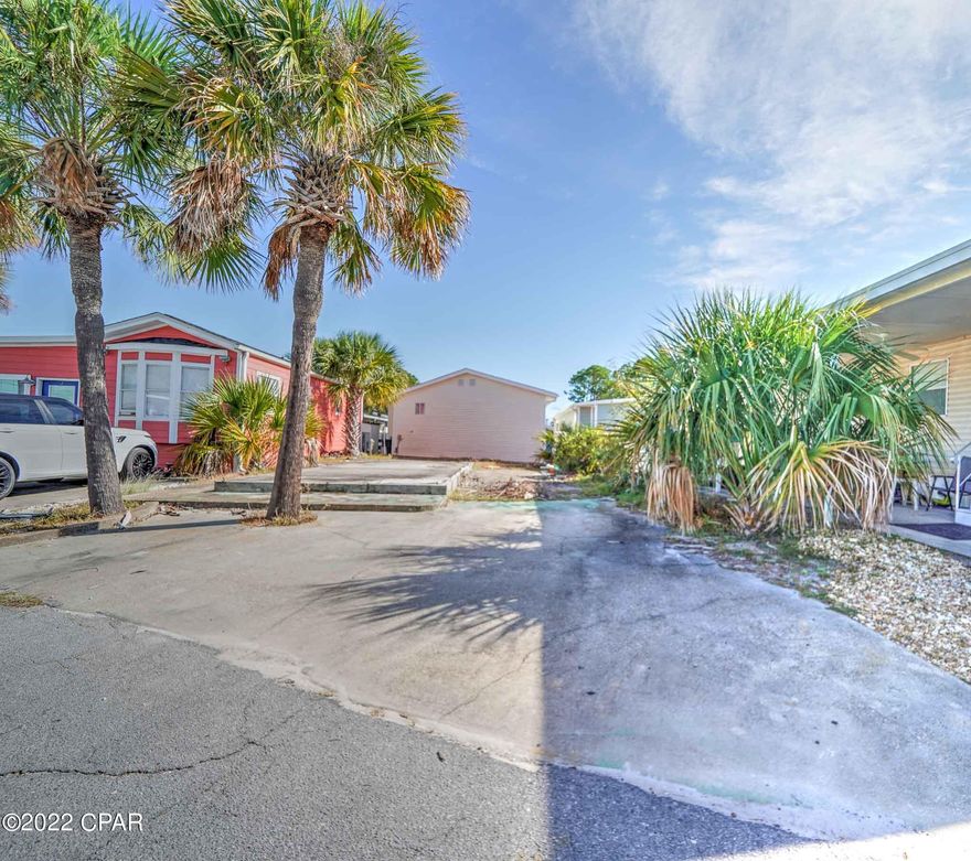 Check out this beautiful lot in popular Venture Out. This vacant lot is in a fantastic location within the resort...close to the bayside pool, playground and fishing pier.  Build your dream home or bring your RV! This one won't last long as lots are highly sought-after! Venture Out offers BOTH beach and bay access! The resort also has 2 pools, tennis, golf, shuffleboard, playground, basketball, fishing pier, boat dock with slips & boat ramp. Venture Out is a golf cart community that has exploded in popularity within the last few years. A gated community that's great for full time residency or just to vacation. 24-hour security & friendly atmosphere. It's all here!!