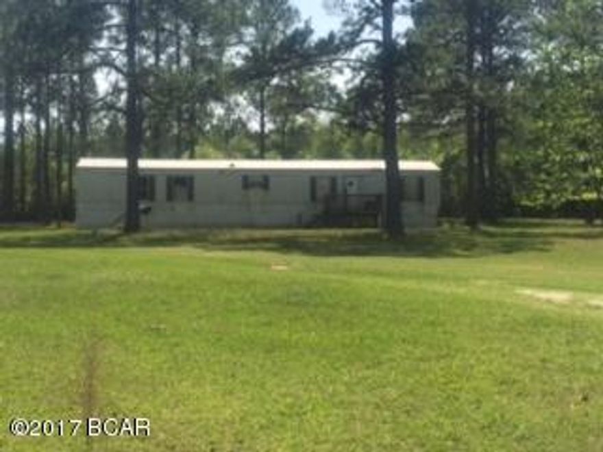 Bring your fishing poles, wigglers and boat! This 22 acre parcel is mostly wooded and is located just 1.5 miles from the Choctawhatchee River and boat launch landing. Property offers plenty of options to build your dream home.  As a added bonus to this treasure, there is a 2/2 SWMH with well and septic located on the property. Don't let this piece pass you by, call for your showing today!