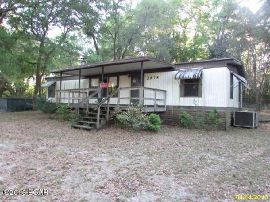 GREAT OPPORTUNITY.. Located in Marianna City Limits sits this 3 Bedroom 2 Bath DWMH. Located at the end of a dead end street! Located on 1/2 acre. Home needs work, being sold AS-IS. Cal today!! See attachment for PAS requirements and WFHM offer submittal information in MLS document section. To report any concerns with a listing broker/agent or to report any property condition or other concern needing escalation, including concerns related to a previously submitted offer or information on how to place an offer, please see information in the MLS document section.