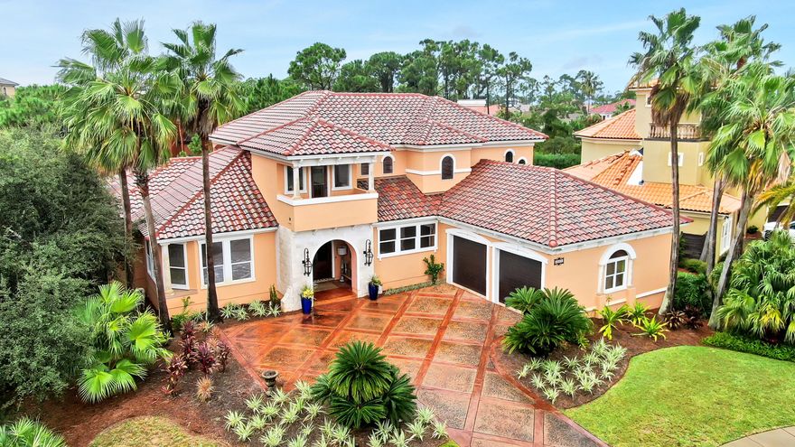 Welcome to your beautiful mediterranean home in the gated neighborhood of Finisterre on the east end of PCB. This 3 bedroom, 2.5 bath boasts numerous upgrades, including high ceilings, crown molding, hardwood floors, built in shelving, butlers pantry, beautiful window treatments, plantation shutters, lots of storage space and many others. Your oversized master suite is located on the 1st floor with his and her closets, 2 bathroom vanities and large walk thru shower. You have gorgeous grand lagoon views from many rooms in the home including one of the upstairs balconies. There is also a large balcony off of the 2nd and 3rd bedrooms upstairs overlooking your beautiful pool, gorgeous lush landscaping and outdoor fireplace. This home comes with a boat slip which will be assigned at closing.