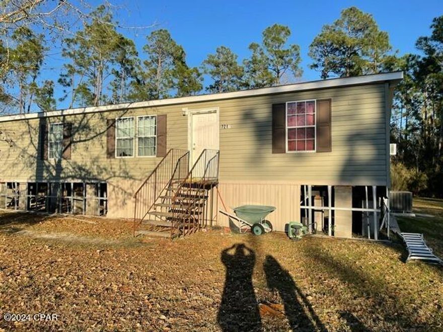 Welcome to this spacious 2014-built mobile home nestled on a generous 1-acre lot. With four bedrooms and two bathrooms, this property offers ample space for comfortable living. HVAC and electrical were updated just a year ago! The interior maintains its original charm, needing work done, allowing you to infuse your personal style and creativity. While the exterior skirting sustained some damage during a hurricane, the home is in prime condition to be made your own. Priced to reflect condition.