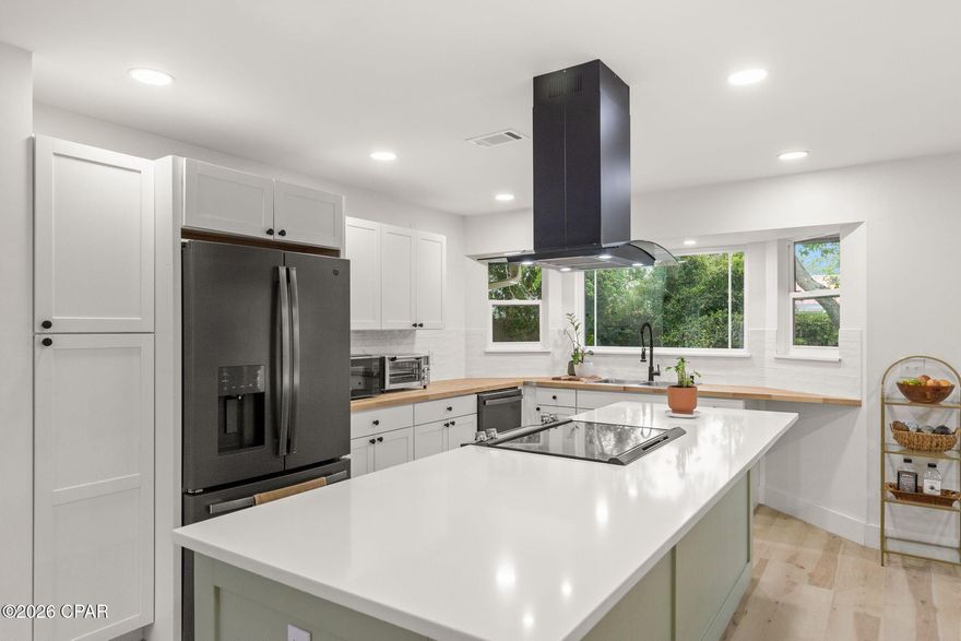 Welcome to this beautifully updated 3-bedroom, 2-bath home offering the perfect blend of comfort, style, and location. Featuring a spacious 2-car garage and a large fenced backyard with plenty of room to add a pool, this property is ideal for both relaxing and entertaining.

Inside, you'll find a remodeled kitchen complete with stunning quartz countertops, modern finishes, and gorgeous flooring that flows throughout the home. The inviting living room boasts a cozy fireplace--perfect for unwinding after a long day.

Located in a prime area, you're just minutes from Pier Park with its shopping, dining, and entertainment, and less than a mile from the beautiful beaches of the Gulf. Enjoy close proximity to outdoor recreation at Frank Brown Park and Aquatic Center, plus a short walk to Scott Field Park.

Conveniently located near Northwest Florida Beaches International Airport and a new hospital currently under construction, this home offers both accessibility and future value. Best of all-no HOA fees!

Whether you're looking for a full-time residence, vacation getaway, or investment opportunity, this home checks all the boxes.