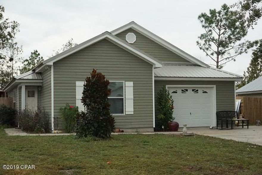 Move in ready home with new metal roof, new vinyl siding, new windows and doors, new privacy fencing and new flooring. You have got to see this 3 bd split floor plan home  with a 1 car over sized garage and a  play house in the back yard the kids will love. Great family community so hurry to see this home before it's gone.