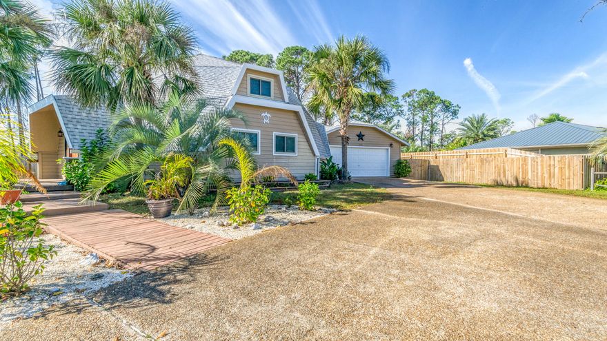 Looking for something SPACIOUS and UNIQUE ? This Dome Style home offers great spaces for living and entertaining. This almost  2300 sq ft home sits on a 90 x 185 lot just minutes from the Navy Base and St Andrew State Park. It's hard to find this much space on the Beach! The inside features OPEN CONCEPT LIVING . A private 2nd floor offers a MASTER SUITE and LOFT AREA.  Both guest bedrooms and guest bath are on the main floor. A 2 car garage and Laundry Room allow for loads of storage. On the outside, the landscaped yard has a well and sprinkler system. The backyard is privacy fenced and has a fun screened porch! If you don't want a  ''Cookie Cutter'' home in the same old neighborhoods, you'll want to see this home and consider all the possibilities!