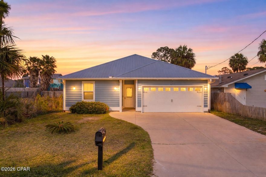 **LENDER INCENTIVES: Closing cost credit and/or rate buy-down available from preferred Lender. Contact Listing Agent for more information.**

Located just south of Grand Lagoon on the coveted East end of Panama City Beach, this 2018-built home offers a combination of modern construction, coastal charm, and short-term rental flexibility with no HOA and solar panels that have already been paid off. 
Step inside to an open-concept layout featuring tile flooring throughout the main living areas and a spacious kitchen designed for everyday living and entertaining. The expansive center island, pantry, and clean finishes create a functional and stylish heart of the home. The split-bedroom floor plan offers privacy. The primary suite includes a walk-in jetted tub, tiled shower, double vanity, and a spacious walk-in closet.
Outside, the fully fenced backyard with an integrated sprinkler system provides plenty of space to create your ideal outdoor retreat. Whether you're envisioning a garden, grilling area, or private lounge space, this lot offers the flexibility to make it your own. The home also features a durable metal roof, Hardie Board siding, leaf guarded gutters, and an attached two-car garage with additional driveway parking.
Located just minutes from beach access, boat ramps, and local favorites for dining and entertainment, this home is ideal for full-time living, seasonal use, or investment. This is coastal living, simplified. Call today to schedule your showing!