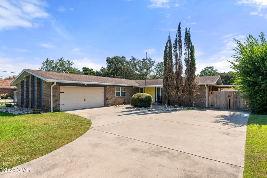 CURRENTLY UNDER CONTRACT, SELLER WILL CONSIDER BACKUP OFFERS Come put all your own touches on this diamond in the rough.  Great floor plan,  4-bedroom, 2-bathroom gem in the Kenwood neighborhood! With a sunroom that screams ''relax here,'' a two-car garage for your chariots, and room for an RV with its own power-up station, this place is a dream! Plus, there's an outdoor carport just waiting for your boat or that secret hunting workshop you've been dreaming of!