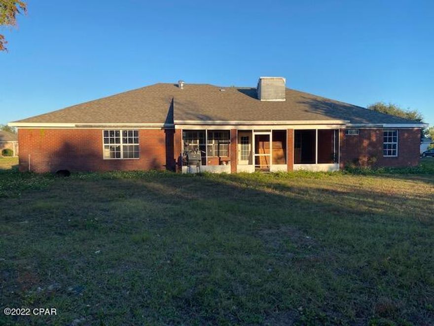 Currently under Contract, Seller will consider backup offers. This 4br/2ba 2,500 sqft. brick home originally built in 1999 is being returned to its previous glory! Hurricane damage to home is in the process of being completely repaired, and price reflects the as-is condition as the ongoing work progresses, so will be increasing as more work is done. Contractor owners previously replaced the roof and removed much of the interior sheet rock. Soffits and fascia have been repaired, yard is being cleared, and present plans are for the back porch/patio to be turned into a lovely enclosed sun room with it's own fireplace!

Home is in the quaint, high and dry neighborhood of Pelican Point, and has easy access to Panama City. The 600sqft yard building also conveys. No Association fees... Come buy this under construction home before the price goes up any more!