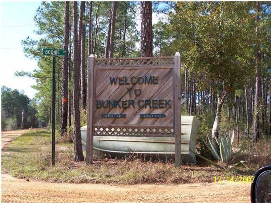 BUNKER CREEK mobile home on 2 lots with approximately 150 feet on canal greta for a fish camp or get away. Home has access to the Choctawhatchee River and Inter Coastal. A short boat ride takes you to the bay. This secluded lifestyle is hard to find today and with the planned growth for our area, this type property will become harder to find. Property being sold ''As Is'' with right to inspect. (All ages, room sizes, Square Footage, and Lot Size are approximate. Please measure if important.)