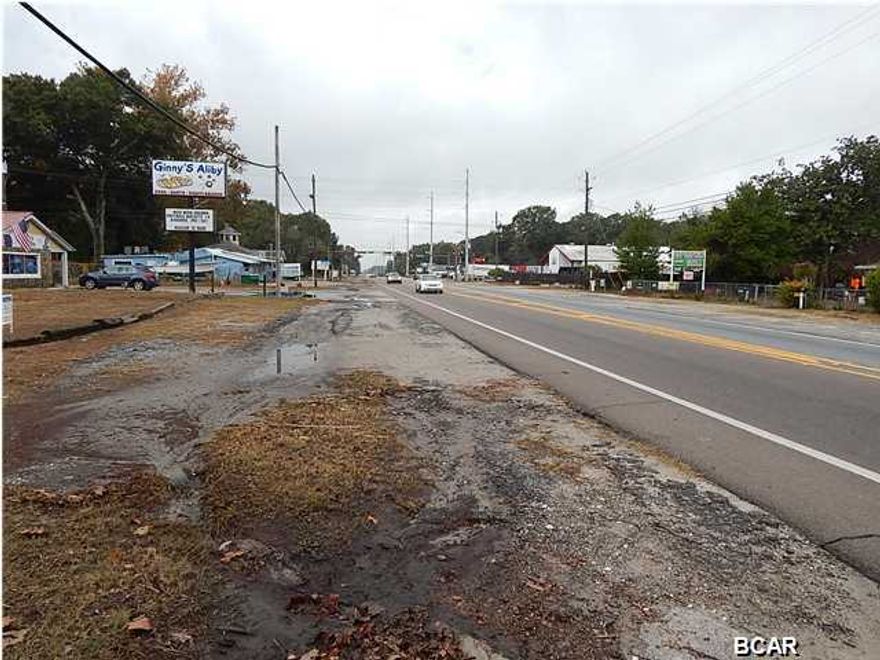 Centrally located 8+ room, freestanding building and garage with General Commercial business applications including extra 100x100 lot with 100''of Hwy 22 frontage 1 +/- block (s) off Hwy 98 in Callaway. Great application for Car dealership, thrift store, AC/Heat business, Auto Repair or any start up business that needs office, garage and plenty of parking space with easy access to major hwy. This large home/building sits on almost .65 acres with zoning that would permit a business with lots of road frontage on Hwy 22. The floor plan lends itself to easy remodel for office space that would accommodate 4+ offices, Executive Office with bath, Waiting/Reception area and full kitchen with appliances included. Since this is zoned general commercial with easy access off of 4+ lane highway.