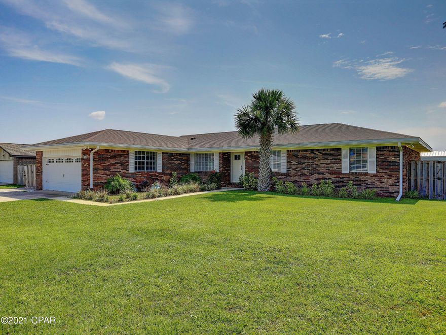 'CURRENTLY UNDER CONTRACT, SELLER ACCEPTING BACKUP OFFERS  Welcome Home and RELAX in your own personal oasis!  Conveniently located on a quiet, corner lot in Lynn Haven, minutes to shopping, restaurants, beaches, parks, boat launch, TAFB, and MORE!  This well kept brick home features a cozy fireplace in the sunken living room, an updated kitchen with granite countertops and fresh appliances!  Cool off in the recently  resurfaced gunite salt water pool or perhaps the hot tub!  Or watching the family from the huge covered porch.  3000 SF of outdoor pavers provide lots of additional parking and outdoor space.  Be confident in the recently replaced roof, HVAC system, and windows.  Do NOT delay - schedule your showing today!