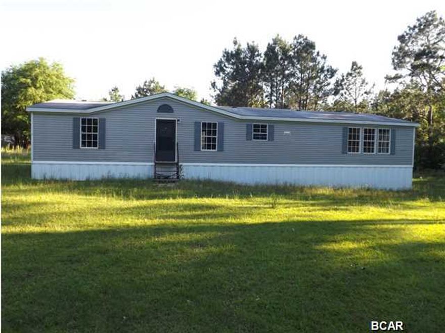 Reduced!!! Better than renting. Great Starter manufactured Home in Bonifay, The house is a large three Bedroom / 2 Bathroom situated on over an acres is move in ready with fresh paint. Eat-in kitchen offers lots of counter & counter top space. New A/C was recently installed. Offered as is.