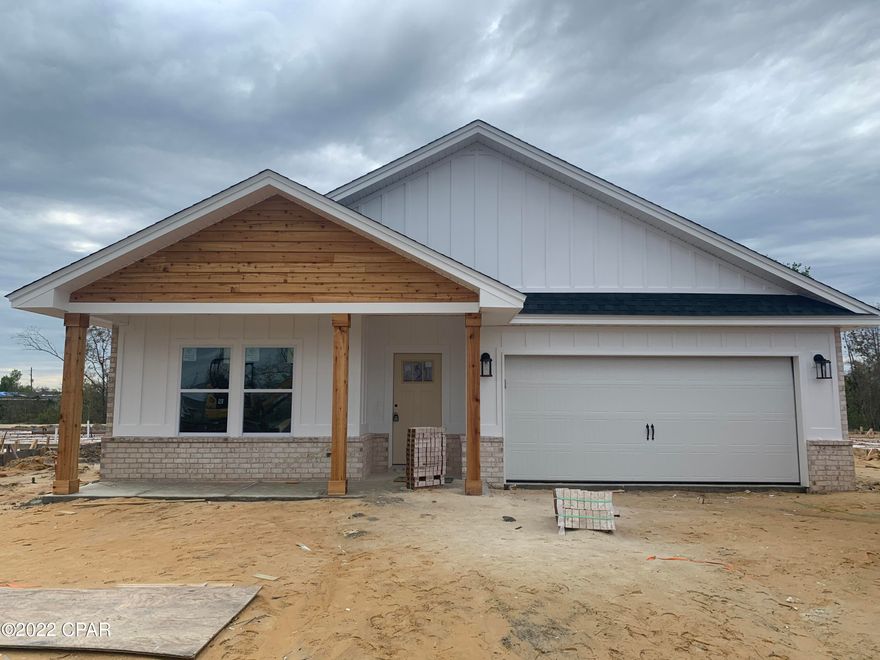 Now is your chance to own a new construction 4 bedroom, 2 bath room in an upcoming new subdivision.  House is conveniently located off Hwy 231 in this 18 house new subdivision., Outlaws Way.   Nothing has been left to chance in this property.  As you drive up to the house, you will notice the landscaped yards with an irrigation system.  and the craftsman feel of this brick//hardy board house.  The floorplan is perfect as the front bedroom is located so it can be used  as a home office or playroom/tv room.  Custom features are found throughout the homes with upgrades of  9 ft ceilings,  large island in with kitchen with custom cabinetry, granite countertops, stainless steel appliances.  The master suite features a double vanity, garden tub with separate shower and a large walk in closet. This house is perfect for entertaining with the open floorplan of the kitchen overlooking a large great room and flows to the outside covered porch which is perfect for your family and friends.  House to be completed in 30 to 45 days so tour today so you will be the proud owner of this house that you can make into your home.  All information contained herein is believed to be accurate and true however the buyer assumes complete responsibility to verify all information.