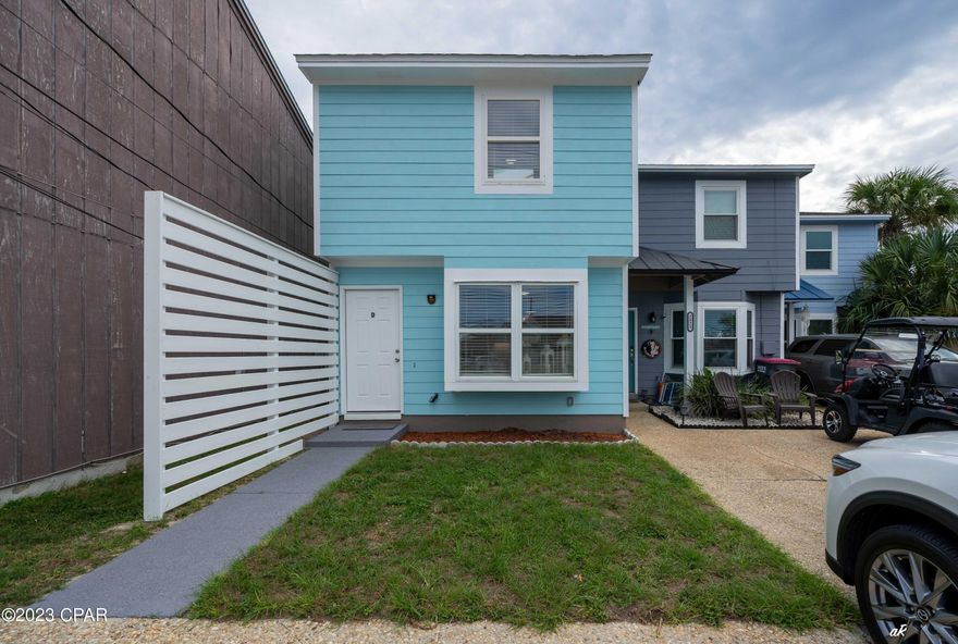 'CURRENTLY UNDER CONTRACT, SELLER WILL CONSIDER BACKUP OFFERS
NO HOA AND NO RESTRICTIONS ON RENTALS!  Perfect for primary or investment.   Eastside Gem!!!  Location, Location, Location! Check out this beautiful newly renovated 2/1.5 townhome conveniently located right off North Lagoon and around the corner from the beaches and St. Andrews State Park where you can dock your boat and get to Shell Island. Short term rentals are allowed, we have this pristine townhome furnished ready to go.  All NEW Paint and LVP flooring throughout entire floor plan. New kitchen including cabinets, appliances, Quart's countertops and under cabinet lighting as well as new LED lighting. Downstairs powder room finished with shiplap accent and carried over to an accent wall in the living area boasting a bay window.  Upstairs 2 large bedrooms with a good size bathroom with new tub/shower combo and vanity.  Laundry room refinished with new cabinets and extra-large pantry downstairs as well.  Roof 2019 and water heater AC 2022, hooked up to sewer 2022, New fence in back yard for privacy.  This would make a perfect rental, second home or primary whatever you need to enjoy our beautiful beaches.