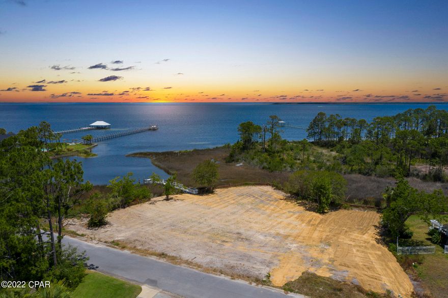 CURRENTLY UNDER CONTRACT, SELLER ACCEPTING BACKUP OFFERS!!! LYNN HAVEN BRICK HOME FOR SALE. A ONE of a kind, vacant and buildable lot ready for the construction of your new home! AMAZING location in Kings Point and No HOA! 450-500 feet of water frontage. Size and dimensions are approximate. Please verify if important. .