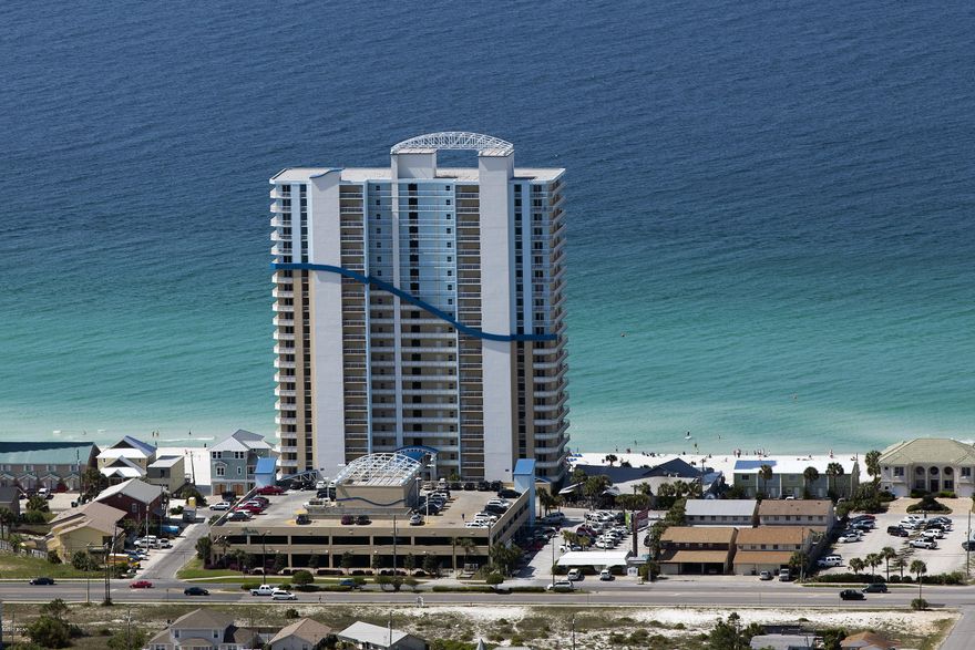 Exceptional, top floor 1 bedroom, 2 bath condo with hall bunks offers the living room & kitchen on the Gulf opening to a lovely balcony for the ultimate coastline & Gulf views.  The condo also offers nice tile floors in the living areas and bathrooms plus upgraded stainless steel appliances in the kitchen.  Seychelles condo dues are $1462.83 per quarter and include ALL of your utilities…Yes, I said ALL!  The condo is currently rented with the onsite management team, ResortQuest, with excellent rental income and no pet or long term rental use. Seychelles also offers many amenities including 2 Gulf front pools & hot tub, a gated parking garage & building, fitness center, conference center, onsite rental, onsite management & much more. Seychelles is conveniently located within walking distance of St. Andrews State Park and only moments from the Marina, where you can enjoy excursions to Shell Island. Convenient to the area's best dining, nightlife, Shipwreck Island water park, Gulf World, ZooWorld, deep sea fishing, sailing, diving, snorkeling and other area attractions. Experience the joy of this wonderful island-style retreat!