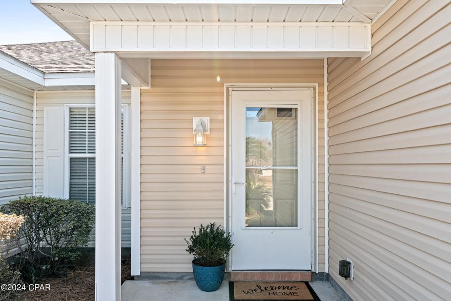 Located in the heart of Lynn Haven, The Hammocks Community is a desirable neighborhood known for its quiet ambiance, well-maintained landscaping, and paved sidewalks. This stunning 2-bedroom, 2-bathroom townhome features an open floor plan with high vaulted ceilings, giving it a modern and spacious feel. You'll love the convenience of community living as you relax by the pool with your friends and family, while the upkeep of your townhome landscaping is taken care of. This home is move-in ready with a new roof, new outside vinyl, and kitchen appliances that are only 5 years old. The Master Bedroom features a double vanity as well as two walk in closets. The AC unit has been regularly serviced, ensuring your comfort all year round. The back porch is spacious, providing ample room for creating your Florida oasis and enough room to spare for grilling on the side. Don't miss out on this fantastic opportunity.