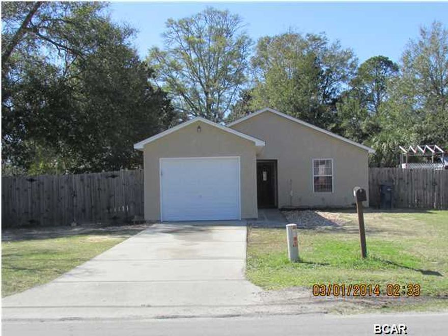 WHY RENT when you can BUY this home for less than renting at record low interest rates. This is a very nice and well maintained 3/2, split floor plan home which is situated on a large corner lot.  House has a new roof and A/C,  and offers nice light fixtures, tile flooring, large master bedroom, two additional bedrooms which are very spacious. There is a charming covered patio for your outdoor entertaining, property is very low maintenance making it the prefect starter home or if you are down sizing this would be perfect.  Centrally located to hospitals, schools,  and the wonderful Historical Downtown area.  Call for your private showing today, all ages, sized including sq. ft. are approximate measure if important.