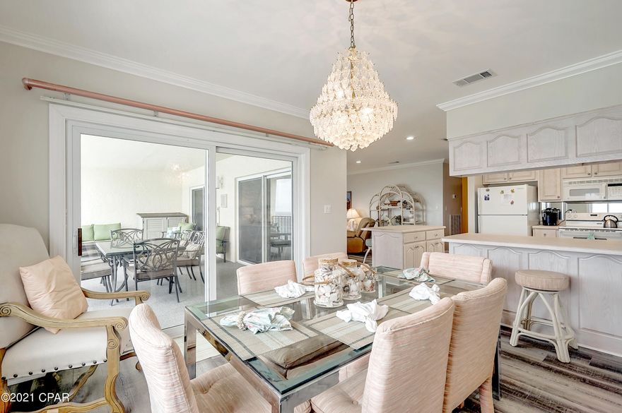 *CURRENTLY UNDER CONTRACT, SELLER ACCEPTING BACKUP OFFERS*  Immerse yourself in this crisp, partially-furnished 4-bedroom 2-bathroom, CORNER PENTHOUSE condominium.  Notable previous owners.  The Master Bedroom opens to a secluded private balcony; perfect for morning coffee as you wave to the dolphins swimming past.   You could opt to start your days in the combined open space of the great room/kitchen/dining/ and primary balcony that flows like the emerald green Gulf it faces.  The kitchen is spacious with a breakfast bar and loads of storage.  Breathtaking views from the Dining Room are a sure complement to every meal.  Carpet/LVP Flooring and A/C Unit were just replaced in 2019; Water heater replaced in 2020.  New Refridgerator.  Regency Towers offers resort amenities including: Gated Community; 24hr Security; two Gulf-front Pools (one heated); Tiki Bar; Game Room; Fitness Room.  This location can't be beat as it's close to St. Andrew's State Park, shopping and local dining! Act now!  This Corner Penthouse is sure to please!!