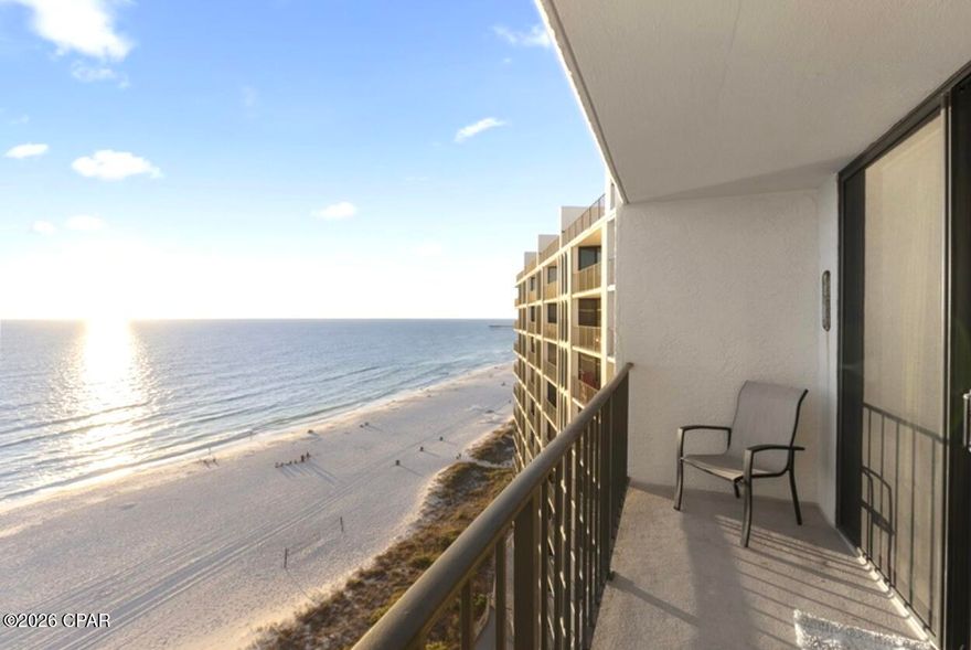 Wake up to sunlit Gulf views and the sound of waves just beyond your balcony in this beachfront condo located within one of Panama City Beach's most sought-after resort communities. Positioned directly on the sand, this residence offers a front-row seat to emerald water, sugar-white beaches, and unforgettable sunsets that make the Emerald Coast famous.

Inside, the layout is designed to maximize both comfort and views, creating a spacious coastal retreat ideal for personal getaways or income-producing short-term rentals. Large windows and sliding glass doors bring natural light inside while framing panoramic beach scenery from the living space and private balcony.

The resort lifestyle sets this property apart from other units in the building. Owners and guests enjoy access to a vibrant collection of amenities including resort-style pools, beach access just steps away, on-site dining, tennis courts, and activities that keep visitors returning year after year. With short-term rentals permitted, this condo offers flexibility for investors seeking strong vacation rental potential or buyers wanting a private beachfront escape with income opportunities.

Whether you're looking for a personal coastal getaway or a property that stands out in the vacation rental market, this beachfront condo delivers the tranquil Gulf-front experience buyers come to Panama City Beach for.