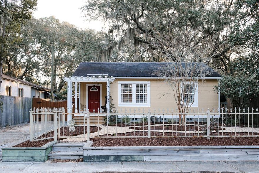 Beautifully renovated 3 bedroom 2 bath cottage home within walking distance of St. Andrews Bay in about every direction.  Home was upgraded with new electric, plumbing, roof, HVAC and refinished hardwood floors prior to current ownership, then current owner continued improvements with tankless gas water heater, replaced garage roof and side door, repainted exterior adding gutters and rain cistern, sealed crawl space, graded front yard, installed retaining wall, landscaped including crepe myrtle and arbor with jasmine, built porch and steps relocated entry door, installed back door with large window, replaced and relocated sewer line from Linda Ave. to Allen Ave. Remodeled back sitting room into functional utility, moved washer and dryer from garage to utility room, expanded master bedroom, installed a walk-in closet and expanded master bathroom installing new toilet, sink/cabinet and shower.  Installed tile in foyer, dining, kitchen, utility and both bathrooms.  Installed hardwood throughout the remainder of the home inclusing the master bedroom and walk in closet.  Remodeled kitchen with upgraded appliances, new solid wood cabinets and granite countertops.  Remodeled guest bathroom with toilet, sink/cabinet and refinished tub/shower.  Installed pocket doors in masterbedroom suite for most efficient use of space