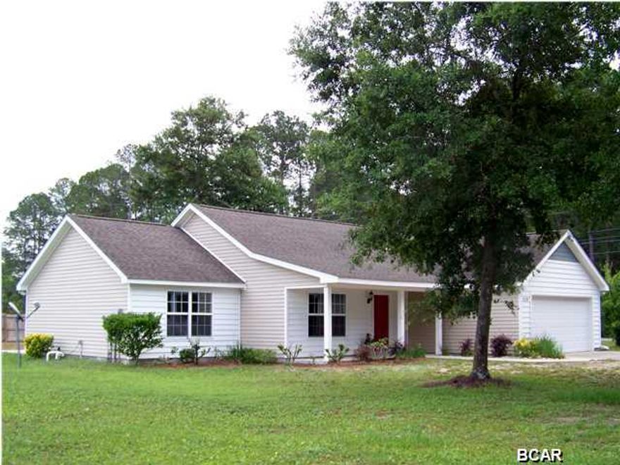 OPEN Saturday October 11, 2014 11:00 AM to 2:00 PM . Lynn Haven Contemporary with large inviting spaces and lots of stylish extra's! Cathedral ceilings, large sunny windows and Upscale Ceramic Tile throughout make the most of this Open Concept floor plan. The large Breakfast Bar connects the kitchen and living spaces. Solid Surface Counter Tops, New Stainless Appliances and Beautiful New Cabinetry make the Kitchen , the Heart of this home. The adjoining Laundry Room and Pantry provide additional storage and convenience. An extra bonus space, located off the living area, would make a great Office or private Den. The Master Bedroom is a private retreat and features tray ceilings , a walk in closet, plus a great private Bath with a separate shower and soaker tub. The additional bedrooms