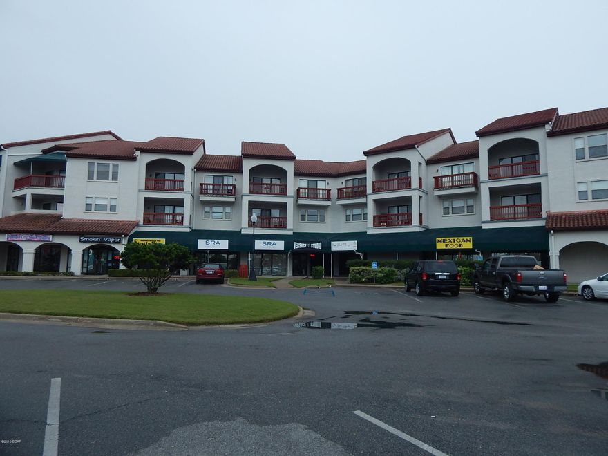 If you are looking for an exceptional condo under $100,000, low HOA fees and walking distance to the beach, restaurant, shopping.....this is it.  This unit has been well maintained and one of nicest. Recently remodeled with custom laminated wood floors, stainless steel appliances and upgraded kitchen with new Cherry wood cabinets. Bathroom has also been upgraded.  Large master bedroom with large closet. Complex features a community pool, clubhouse, boat docks and tennis courts. Shops and restaurants on site on the 1st floor.  Great affordable second home or vacation rental.