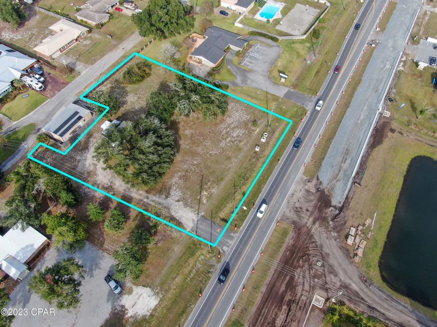 High, Dry and cleared, this is truly a rare find in our market. This beautiful 1.2 +/- acre parcel is ready for development and affordably priced for a future medical/business office, QSR or retail store. Fence on north border of parcel conveys with purchase, features 'double gate' providing access to Pretty Bayou Island Dr.
