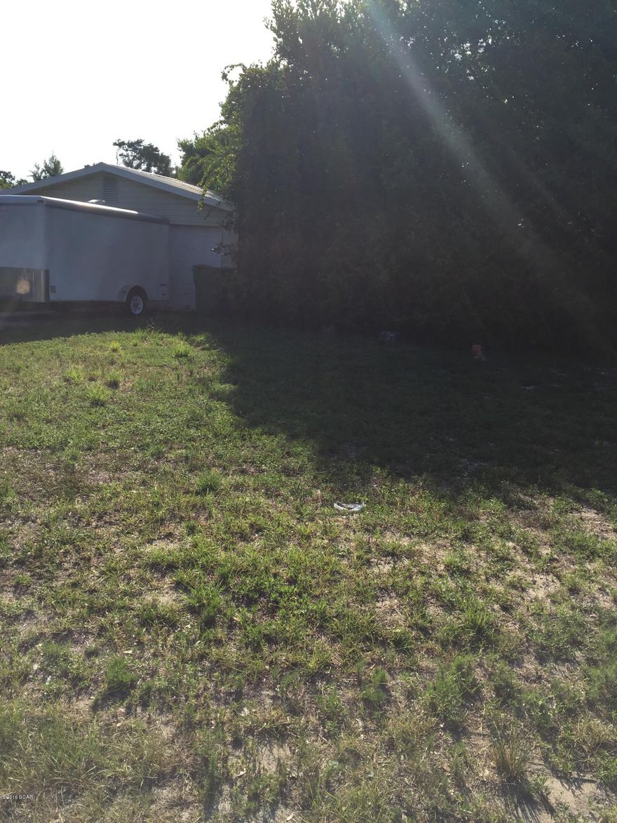 Nice building lot 3 blocks from dedicated beach.