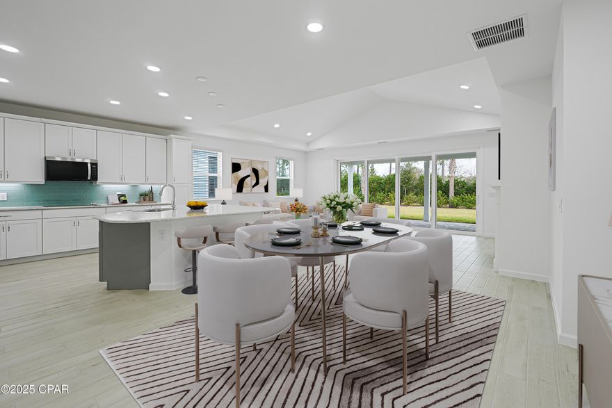 Latitude Margaritaville Watersound a beautiful coastal 55+ community just 7 miles from the BEACH! Brand New Breeze Bay, Phase 7- Never Lived In!

Stunning 3-bedroom, 3-bath Breeze Bay featuring an open-concept design perfect for coastal living and entertaining. This highly upgraded home showcases beautiful tile floors throughout, a chef's kitchen with quartz countertops, tile backsplash, solid surface cooktop, and built-in wall oven. The oversized island seamlessly connects the dining and great room with a cozy gas fireplace and a full wall of glass sliders, creating the ideal gathering space for friends and family. Step out to your own outdoor oasis with a covered lanai and perfect for a future pool. 

The primary suite overlooks the private backyard and includes a luxurious en-suite bath with upgraded tile shower, quartz countertops, and custom cabinetry. Both secondary bedrooms feature their own upgraded tiled showers and elegant finishes, providing comfort and privacy for guests.

Additional upgrades include paver lanai, gas line on the lanai for future pool and 60amp outlet, paver driveway and walkway, upgraded 3 bedroom 3 bath plan with showers in all baths, tile floors throughout, quartz throughout home, hurricane shutters & more! 

Enjoy brand new construction in this sought-after community — a 55+ active adult paradise offering world-class amenities, resort-style pools, fitness center, Pickleball and tennis courts, dining, entertainment, and a golf-cart underpass to explore it all with ease. Adjacent to the community is a coming soon Publix grocery store, shopping, dining and more! A state of the art medical complex is being built with medical office already open and a new 180 bed hospital proposed to open in 2027. 

The HOA fee includes all lawn care, amenities, activities year round & more. Buy with peace of mind with a 1 year Master Care Home Warranty and a 2/10 Structural Warranty from the original buyers close date. 

Come experience the lifestyle Latitude Margaritaville Watersound has to offer!