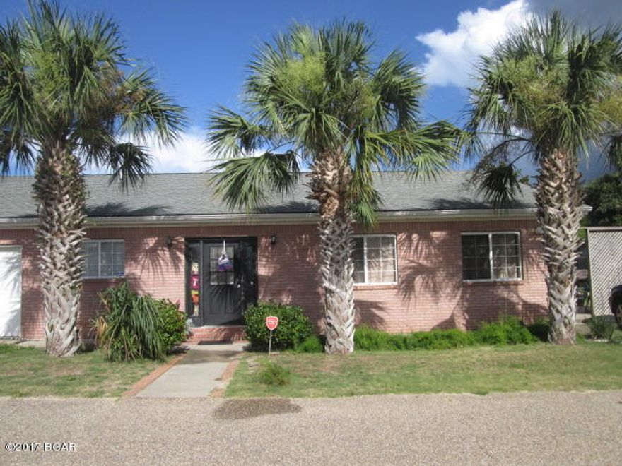 GREAT LOCATION ON HIGHLY DESIRABLE WEST END OF PANAMA CITY BEACH!! Home is within walking distance to the Beach. Home has been converted to 2 bedroom/2bath home with mother-in-law suite. The main part of home is a large 2 bedroom, 2 bath with high ceilings and ceramic tile thru-out. The mother-in-law suite on the other side is approx. 1,000 sq. ft. with own entrance and separate driveway This unit has a 1 bdrm 1 full bath and full kitchen. Home could easily be converted back to a 3 bedroom/2 bath home. Great investment opportunity, or live on one side and have the other side for in-laws and relatives or rent out . Call today to make an appointment to view.