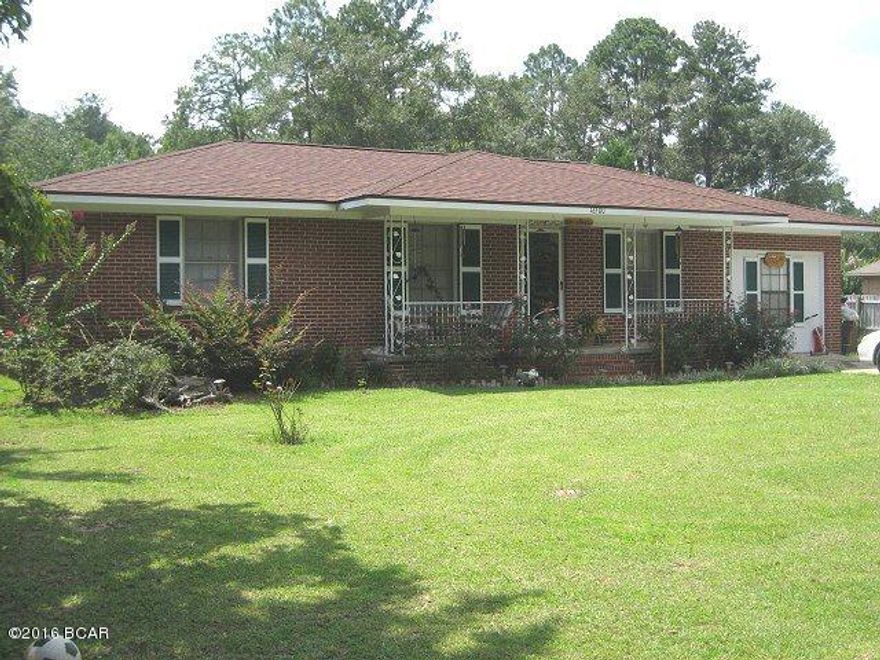 $99,500. Be among the first to view this bargain-priced home on about .75-acre lot in small NW Florida town! This 1,485 sq. ft. home built about 1980 has a recent roof, upgrades to the plumbing, had a deck added on the back, and more. Equipped with central heat and air-conditioning, this comfortable home has 3 BR's (plus an enclosed garage that's presently used as a 4th BR), 1.5 baths, living room, kitchen/dining room, and laundry room. Approximate room measurements are: Living Room - 12' x 15'; Kitchen/DR - 15'5 x 30'; (Kitchen appliances negotiable.) MBR - 11'4 x 12'6; BR2 - 10'2 x 10'; BR3 - 11'2 x 12'6; and Garage BR - 13'10 x 17'8. The original hardwood floors also add a nice appeal. The two lots total 100' x 300', with paved frontage on two sides, city water, sewer, utilities, gas,
