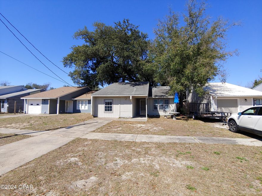Investor Alert! Florida home in quiet neighborhood near bay access and only a few minutes to Tyndall Air Force Base. 

Bay view from front yard and an inviting covered porch. Backyard has plenty of shade and a small covered patio.

Home could use some updates and repairs but central air working great (2010) and essentials are all functional. Perfect to make a quick rental unit. 

Schedule your showing today!

Buyer to confirm all aspects of lot size, location, feasibility, improvements, etc.