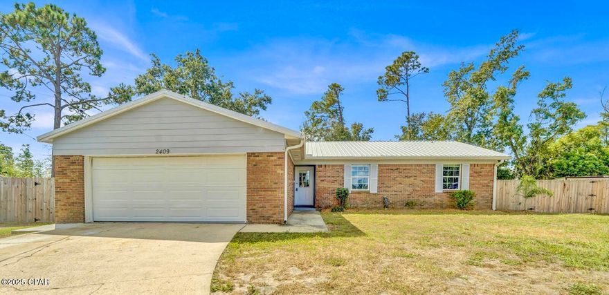 Welcome to 2409 Nicole Drive - A Home Designed for Everyday Comfort and Enjoyment

Life feels easy in this freshly updated 3 bedroom, 2 bath home tucked away in a quiet Panama City neighborhood. From the moment you step inside, you'll notice the bright, welcoming feel—fresh paint, updated bathrooms, and a floor plan that makes gathering with family and friends simple and natural. The primary suite offers a private retreat with a walk-in closet and its own bathroom, while the guest rooms provide oversized closets and plenty of space for loved ones to feel at home.

Evenings are meant to be enjoyed here. Picture yourself unwinding on the covered, screened-in patio as the kids play in the spacious, privacy-fenced backyard. There's room for a garden, a future pool, or weekend barbecues under the stars. The large storage building keeps tools and toys tucked away, and the two-car garage adds everyday convenience.

Beyond the home itself, the location makes life effortless. You're just minutes from Tyndall Air Force Base, downtown Panama City, and the charm of St. Andrews, with restaurants, shops, and entertainment all close by. With no HOA and short-term rental potential, the possibilities are endless—whether you're searching for a forever home or a smart investment.

2409 Nicole Drive isn't just a house—it's the home you've been waiting for.