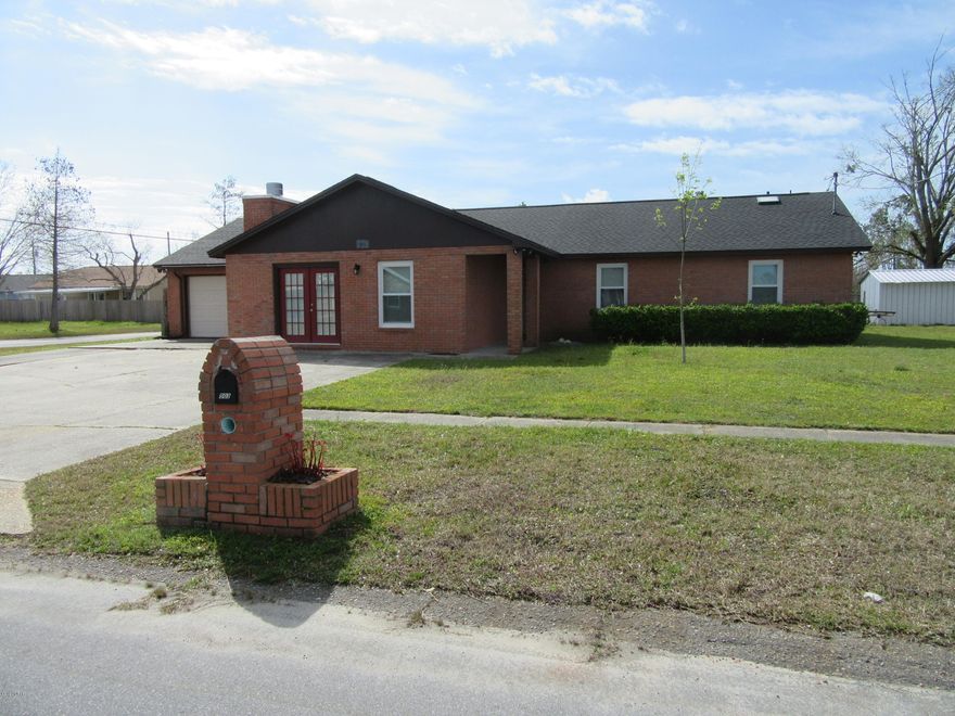 Beautiful newly renovated 3 bedroom 2 bath oversized family/den/entertainment room with fireplace, low maintenance brick and vinyl construction home is conveniently located in the desirable in Lynn Haven. Vinyl wood plank, spacious kitchen with dining area, ceiling fans, ample closets, large laundry room, covered back porch, detached 1 car garage with work shop and storage. All property sizes and ages are approximate, please measure and/or verify if important. School assignments are subject to change, please check with Bay County for most accurate information. Deposit is the same as one month's rent. Pets allowed with owner approval and a $250.00 NON-REFUNDABLE pet fee applies per pet. Breed restrictions apply.