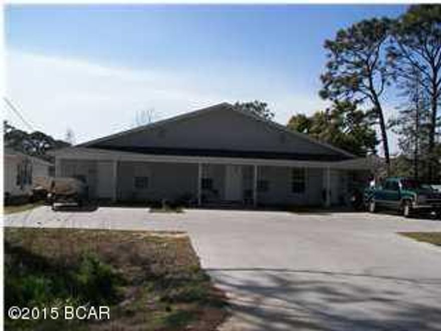 End unit of a triplex with 2 bedrooms, 2 bath, vaulted ceilings in the living room. Small covered patio in the front and open patio off of the master bedroom.