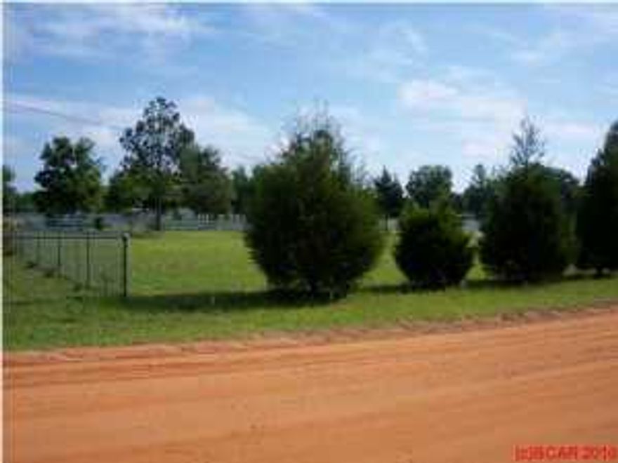 Away from the hustle and bustle of every day life. This ''country living'' lot offers a nice relaxing spot to build a beautiful home. All measurements approximate, will be verified by new survey.