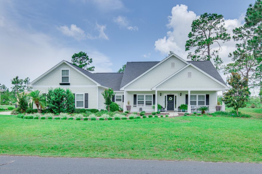 CURRENTLY UNDER CONTRACT, SELLER ACCEPTING BACKUP OFFERS. HOMES LIKE THIS ONE DON'T COME AVAILABLE OFTEN. Situated on almost 1/2 acre and with no neighbors on one side OR behind, this STUNNING home in Colony Club is loaded with upgrades. This is more than just your average ''split-bedroom floor plan.'' Three large bedrooms are on one side of the home, the master is on the other side, then another HUGE bedroom is tucked away over the garage. Enjoy beautiful sunsets from your spacious screened patio with no homes built behind you or on one side. The garage has been heated and cooled (not included in listed square footage) with an insulated garage doo,  there are several SmartHome features and LOADS of parking. Enjoy never ending hot water with your tankless water heater.