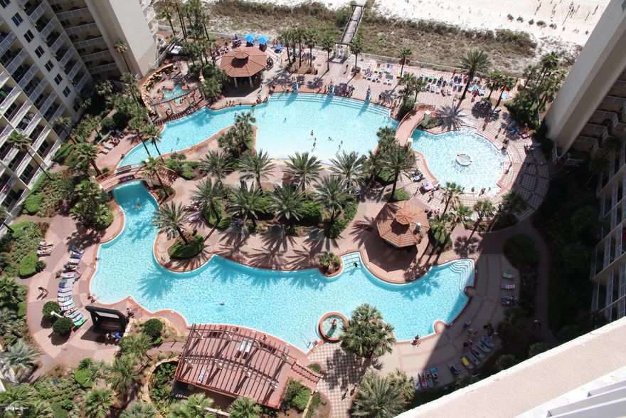 This is a really nice, clean high-floor (great views) condo in Shores of Panama.  INCLUDES A 5TH FLOOR PARKING SPACE.  This condo feels really clean when you walk in.  Clean floors, clean furniture.  The bunkroom has a closet and a window and if you added a door you could advertise it as a 2bd.  This one is the popular ''C'' floorplan at Shores of Panama that has the master bedroom on the gulf and the extra-long balcony.  Make sure that you get this one on your list.