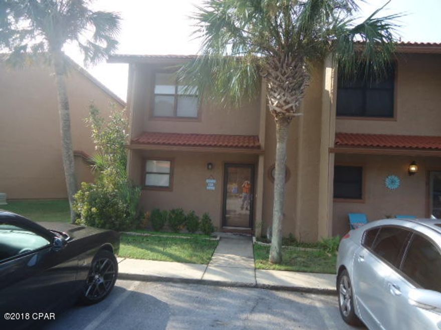 Age, SF, and dimensions approximate. A beautifully maintained ''Island'' unit backing up to Island pool. Downstairs completely tiled. Granite countertops in kitchen with stainless steel appliances. This is an end unit with room to put in golf cart parking. Tankless hot water heater. Tiled shower in master bedroom. Gulf Highlands has 11 pools to include clubhouse with pool on the beach. Complex is gated and pet friendly. Hurry on this one!