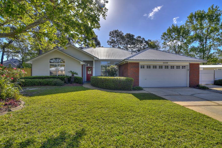 This home is a Traditional Southern style home with a large open floor plan and lots of natural light throughout. Open family room boasts an inviting fireplace wrapped with large arched windows. The kitchen is recently updated with white cabinets, sparkling dark granite, and new appliances. Breakfast bar expands dining options or makes a great place for homework or business. Large casual dining joins the kitchen and the outdoors for numerous entertainment options. Split bedroom plan with large master suite. The master suite has a spacious sitting area or office area.

Also an inground swimming pool and hot tub invites you to entertain in this completely privacy fenced backyard. A bonus is the paved parking area for boat or is even large enough to accommodate a full size RV