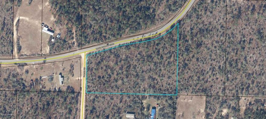 Perfect lot to build your dream home or use for investment property. Quiet, lightly  wooded 5.39 Acres in the country. Frontage on paved road and county maintained roads on two other sides.