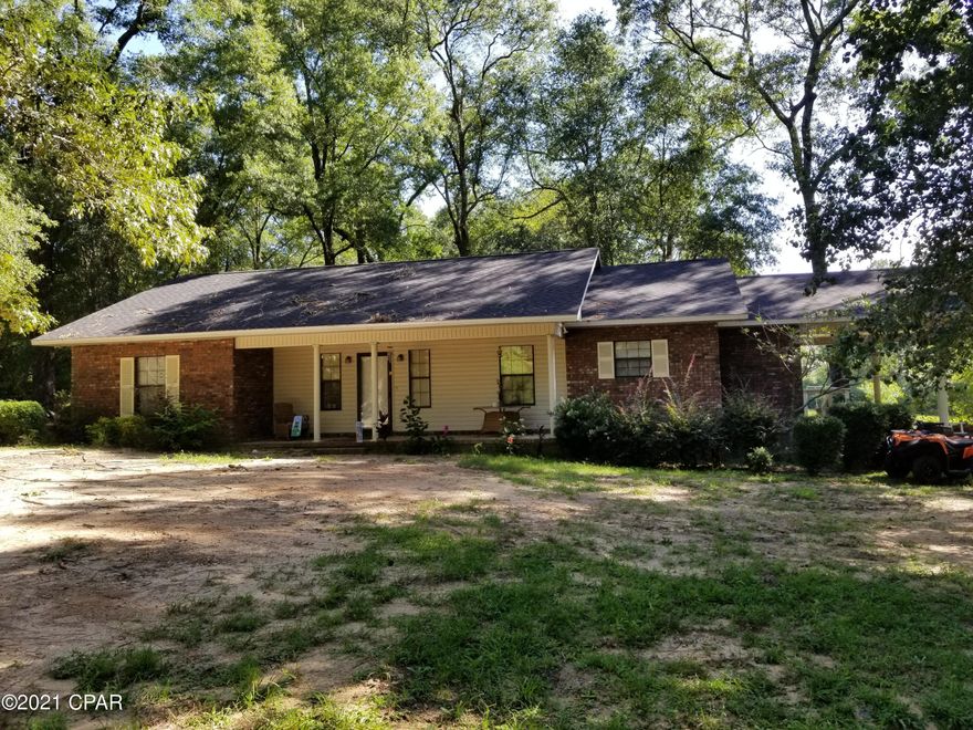 'CURRENTLY UNDER CONTRACT, SELLER ACCEPTING BACKUP OFFERS'This brick home on the golf course of Bonifay Country Club is looking for new owners. Located in the Dogwood Lakes subdivision, the home sits back off the paved road near the back of the lot adjacent to the second fairway and second green. It has some great views of the golf course. It has 3 bedrooms, 2 bathrooms, a covered front porch and a large screened in and covered back porch. It's a great place to relax or grill out. The master bathroom has a very nice tile shower, cabinet space, double vanities, and a walk-in closet. The kitchen cabinets have an oak finish, lots of counter tops and a big breakfast bar with eat-in kitchen. The family room is huge and the center of activity. The pole barn is a man's dream!