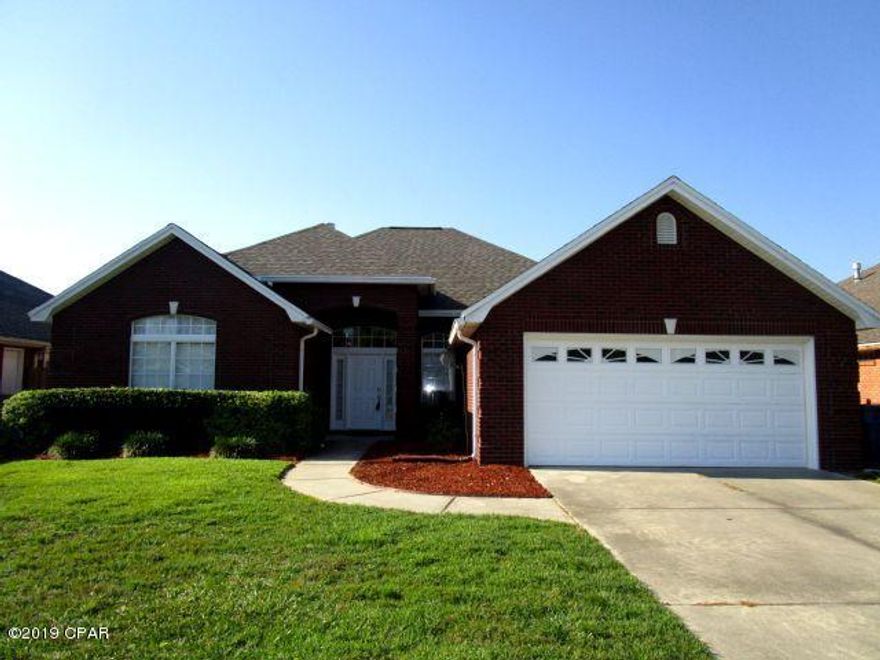BEAUTIFUL POOL HOME IN THE POPULAR AND CENTRALLY-LOCATED HARRISON PLACE!  This home features a Great room with laminate flooring; gas fireplace and built-in bookcases; tiled kitchen with granite counters, white-washed cabinets and stainless-steel appliances; carpeted Master bedroom with tray ceiling, and a Master bath with double vanity, whirlpool tub, and a  separate shower.  Guest bedrooms are carpeted and feature built-in dressers in one and a solid-wood wall-to-wall desk in the second.  Outside the Great room's glass-siding door is the covered patio over-looking the in-ground pool and privacy-fenced yard.  This home has had all hurricane-related repairs completed and is practically new inside and out!  Call today for a list of all of the improvements!