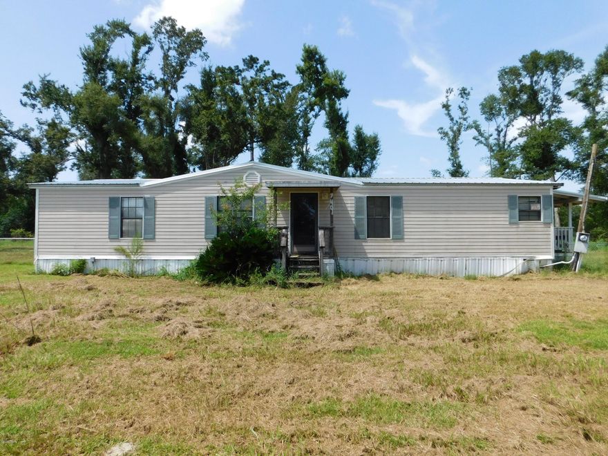 'CURRENTLY UNDER CONTRACT, SELLER ACCEPTING BACKUP OFFERS Looking for an affordable home on an acre of land? Check out this 3 bedroom, 2 bath home just minutes from fresh water fishing. With a little TLC this home would make a great first time home buyer property or rental. The property is mostly cleared with plenty of space to add a pole barn or large workshop. There is currently a small workshop on the property. The interior of the home offers large bedrooms, a good size kitchen with a formal dining area and a huge family room with a fireplace. Call your Realtor today to see this great property. This is a CASH ONLY sale.