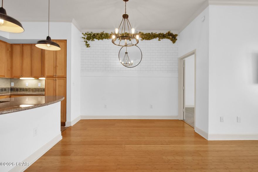 Welcome to this beautifully maintained 2 bedroom, 2.5 bathroom condo offering 1,325 square feet of thoughtfully designed living space. Recently refreshed with fresh paint and professionally cleaned from top to bottom, this unit presents a pristine, MOVE-IN ready opportunity!

The spacious layout provides both comfort and functionality, with generous living areas and well-appointed bedrooms. Step outside to your oversized balcony, perfect for relaxing, entertaining, or enjoying the fresh air year round.

Within this gated community at Island Reserve you will find a RESORT STYLE zero entry pool with a beautiful waterfall feature, a relaxing hot tub and an interactive splash pad. Owners and guests have access to the fitness center, basketball court, game room and media center. Residents can also enjoy the added convenience of parking on any level of the garage, making daily living effortless.

Located on Front Beach Road and convenient to everything within the beach and town, you truly can't ask for a better location. Only 5 minutes to the sandy white beaches and Emerald green waters. Come see this beautiful and immaculate unit today!